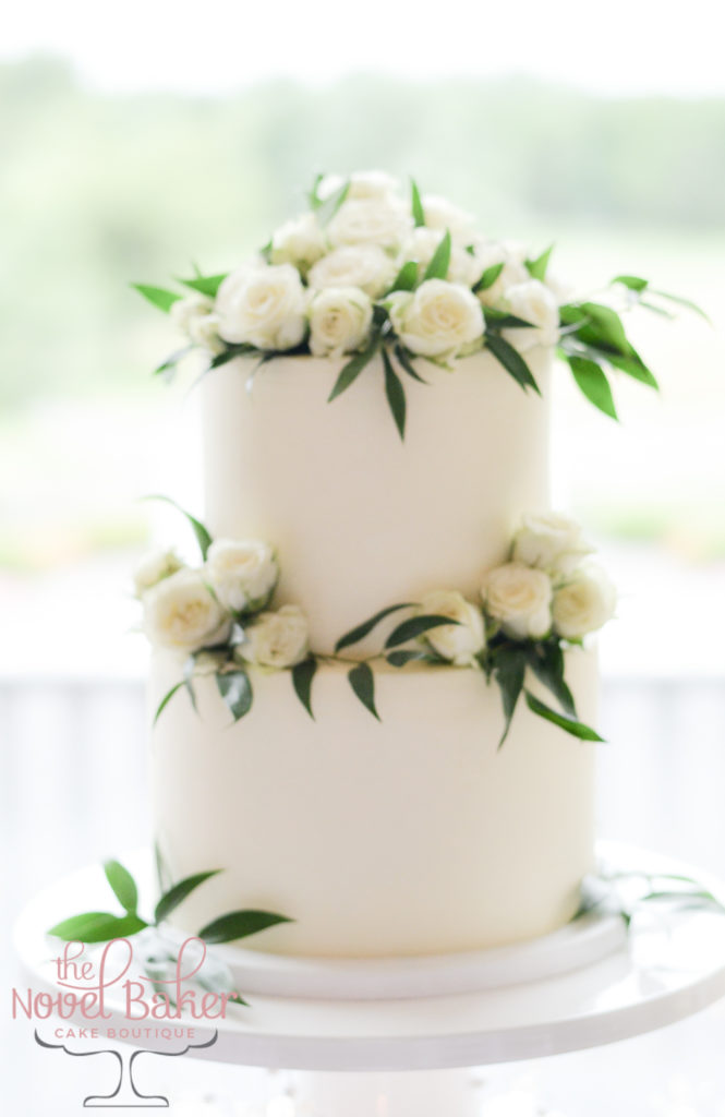Sweetwater Wedding Cake with White Roses and Ruscus